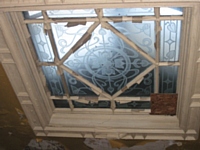 A ceiling panel at risk